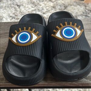 Black Slides with Eye Design